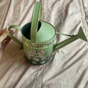 green and pink water can